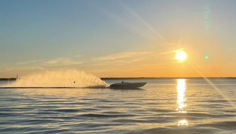 Precisionmarinetx Sunset Boat On Water